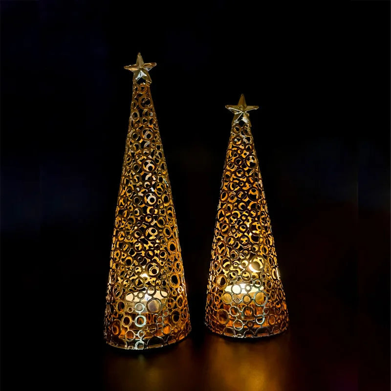 Metal candlestick in the shape of a Christmas tree